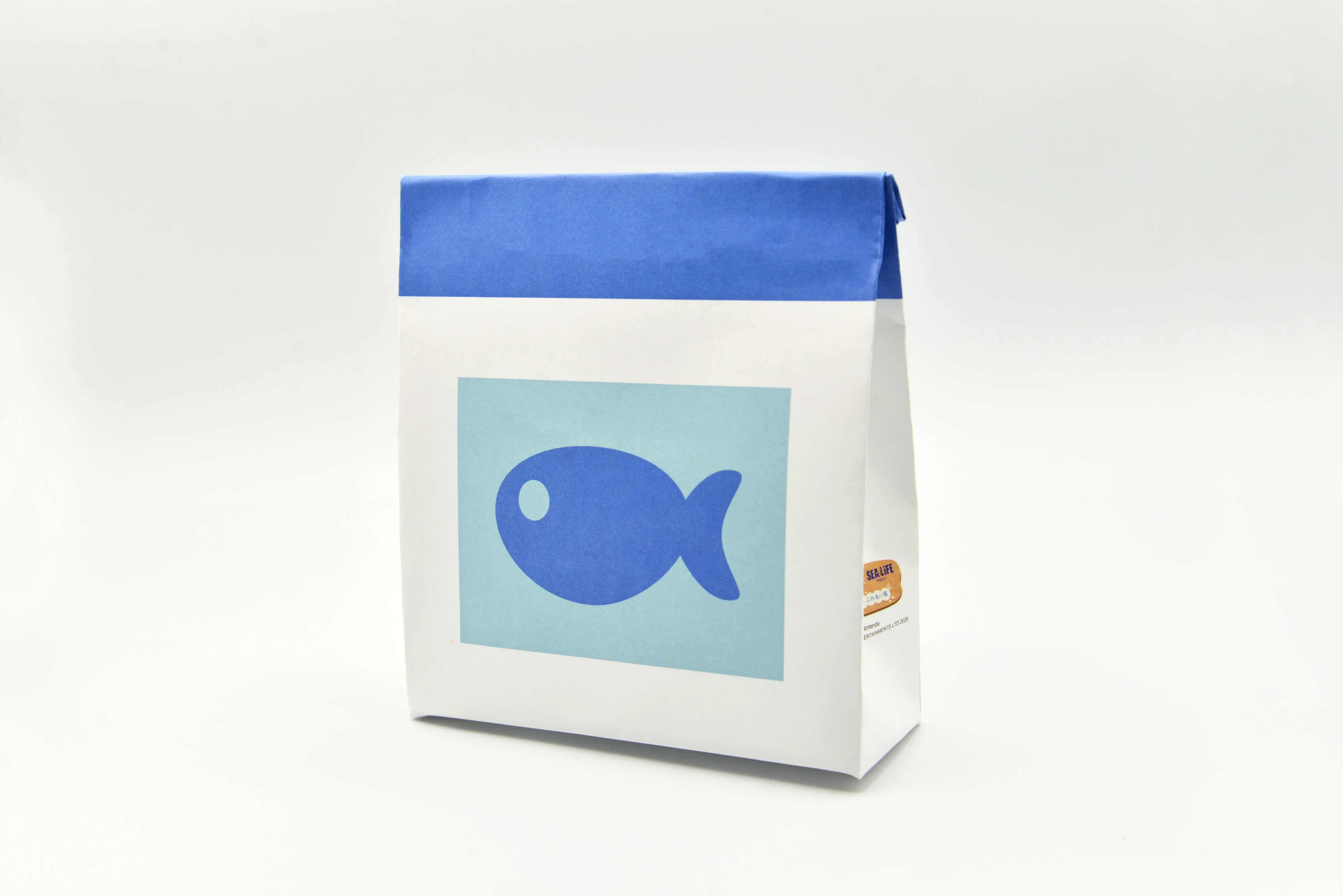 サカナのまきエサ風紙袋